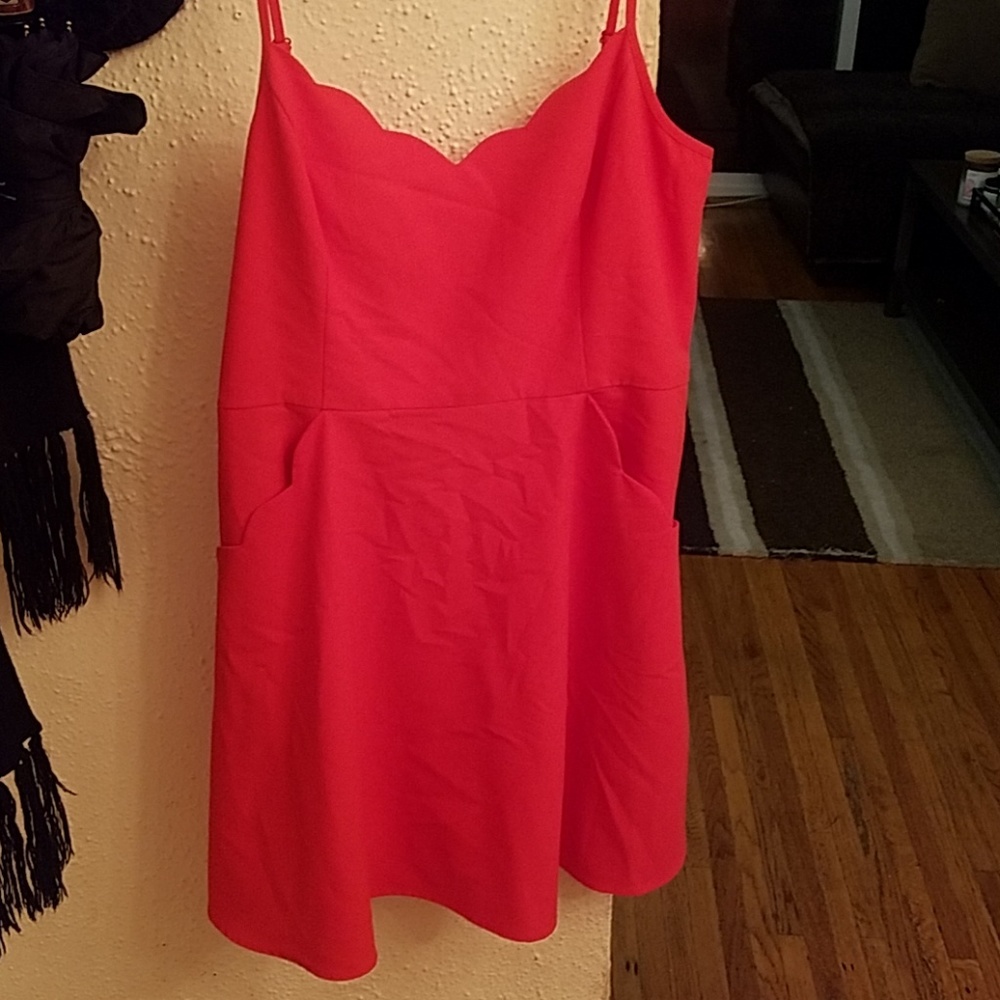 Dress with button closure and peekaboo details